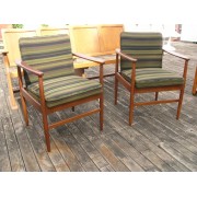 Pair of timber frame chairs, green fabric